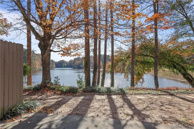 a view of a backyard of the house
