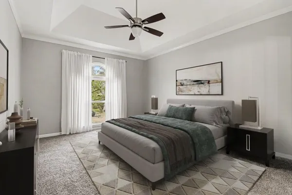 a bedroom with a bed painting on wall and a large window