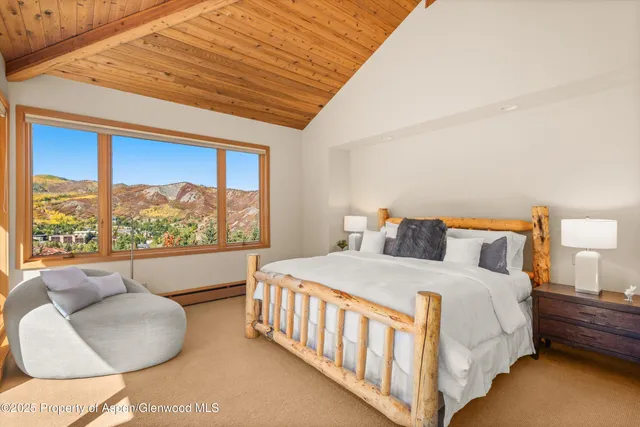 a bathroom with a tub and a sink