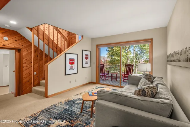 a view of a chairs and table on the wooden floor