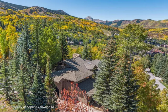a view of roof with city view