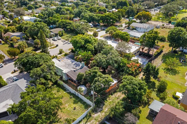 an aerial view of residential building with parking space
