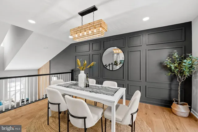 a view of a living room and dining room