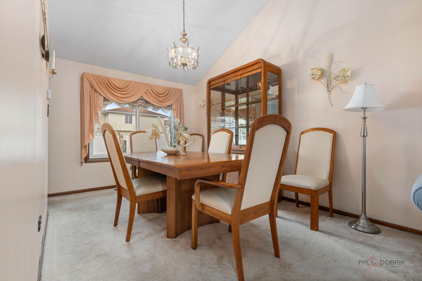 1124 Anvil Court Addison, IL 60101 - Photo 7 of 43 a view of a dining room with furniture and chandelier