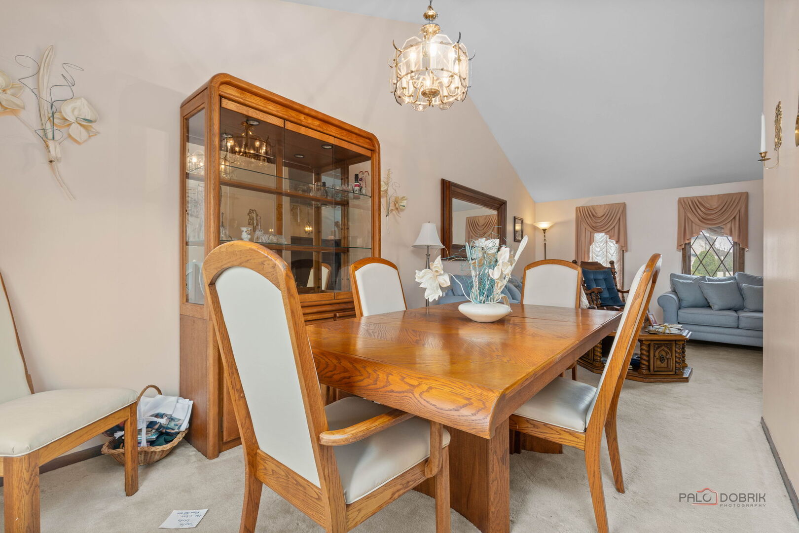 1124 Anvil Court Addison, IL 60101 - Photo 8 of 43 a dining room with furniture a chandelier and window