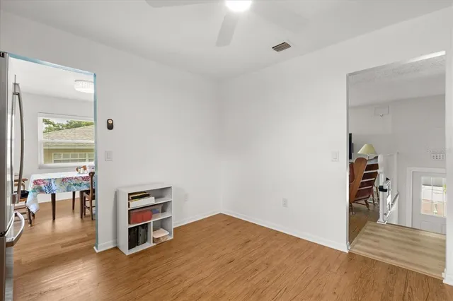 a view of a livingroom with wooden floor