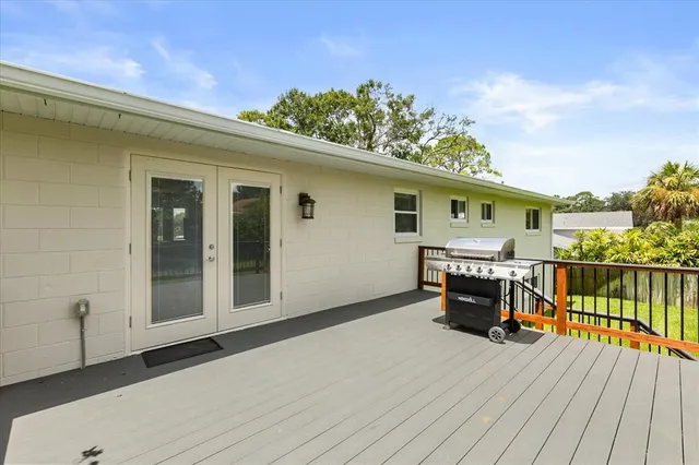 a view of a balcony with furniture