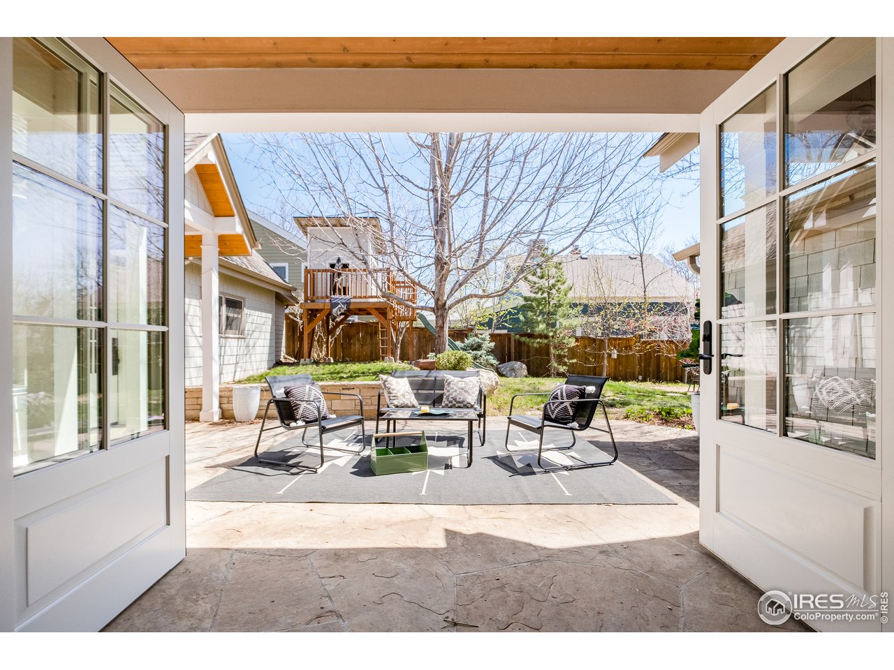 2303 Bluff Street Boulder, CO 80304 - Photo 23 of 40 a building outdoor space with patio furniture and potted plants