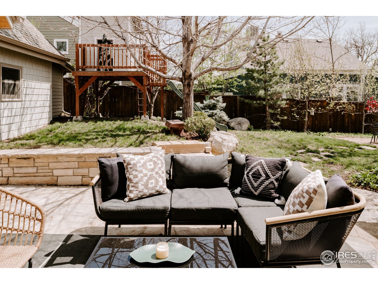 2303 Bluff Street Boulder, CO 80304 - Photo 24 of 40 a view of backyard of house with seating space