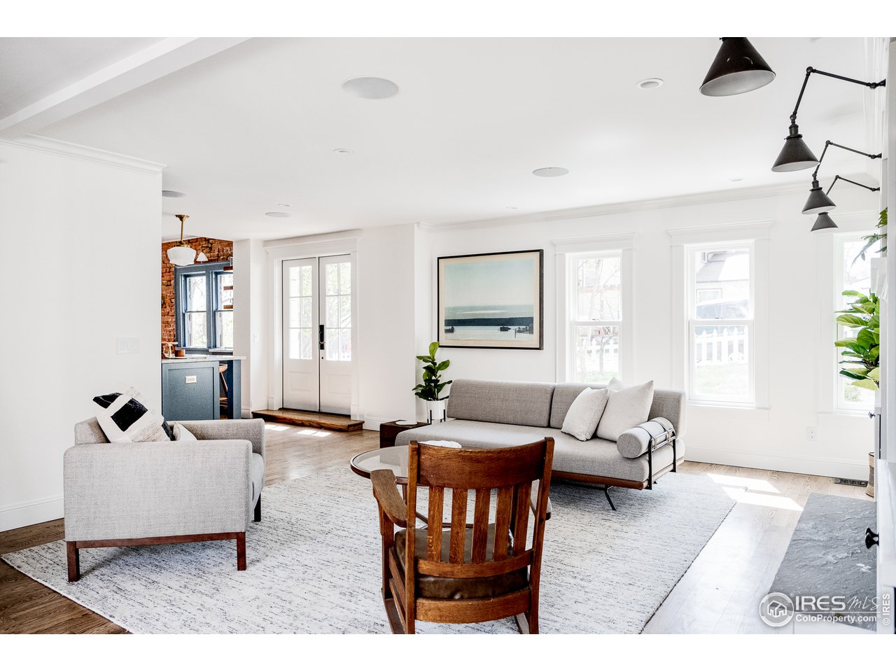 2303 Bluff Street Boulder, CO 80304 - Photo 25 of 40 a living room with furniture and wooden floor