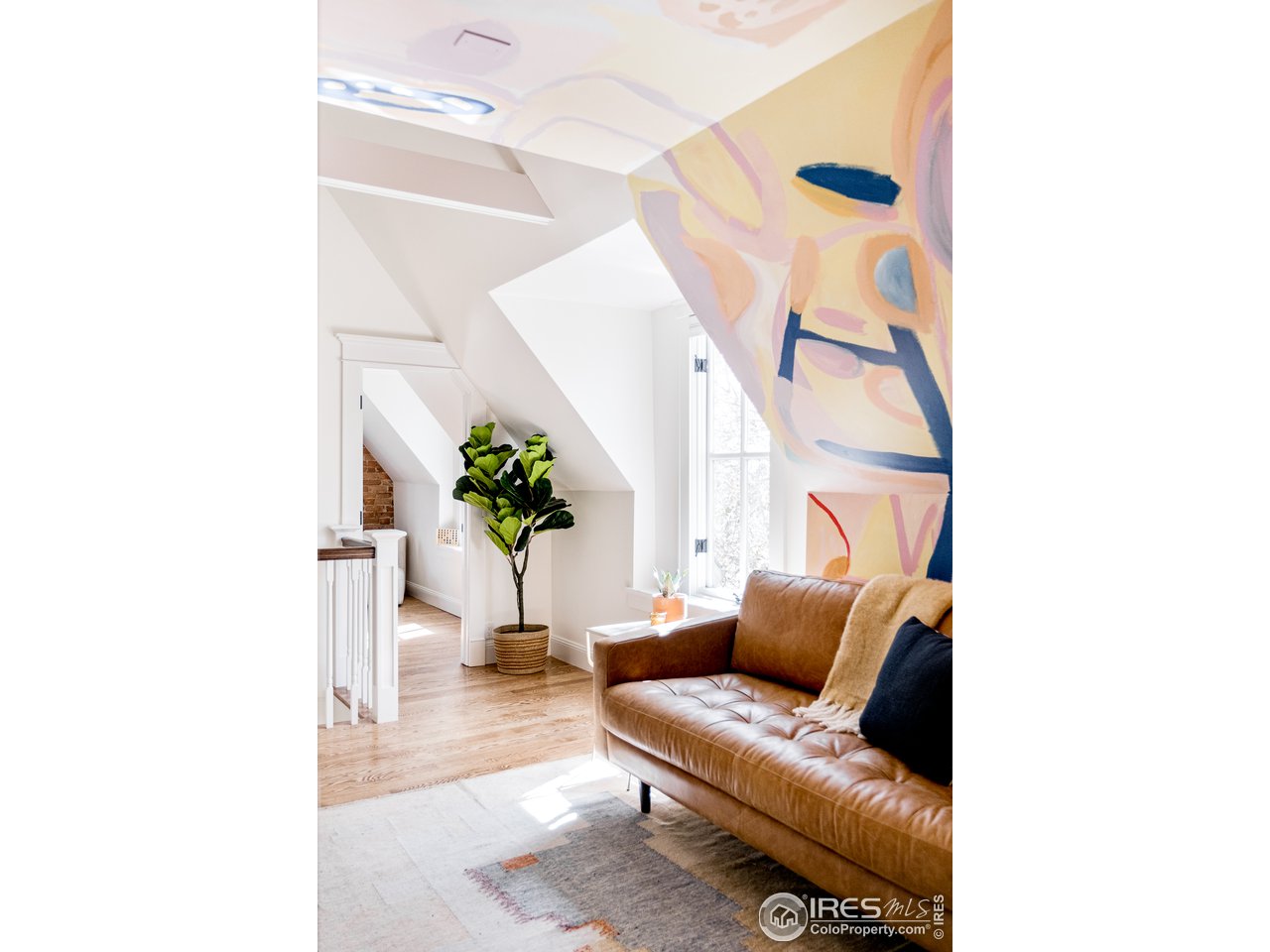 2303 Bluff Street Boulder, CO 80304 - Photo 28 of 40 a living room with furniture and a potted plant
