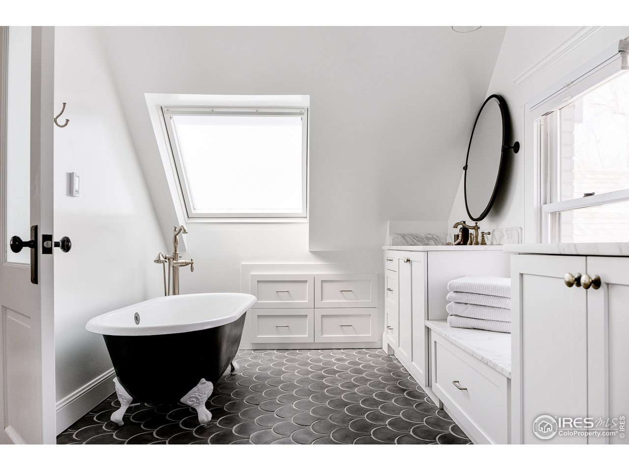 2303 Bluff Street Boulder, CO 80304 - Photo 33 of 40 a bathroom with a sink and a mirror