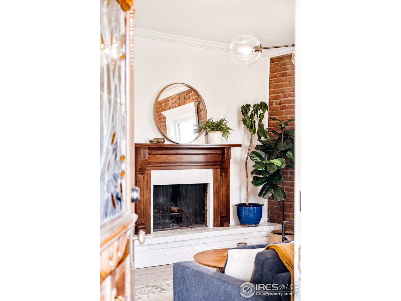 2303 Bluff Street Boulder, CO 80304 - Photo 6 of 40 a living room with furniture and a fireplace