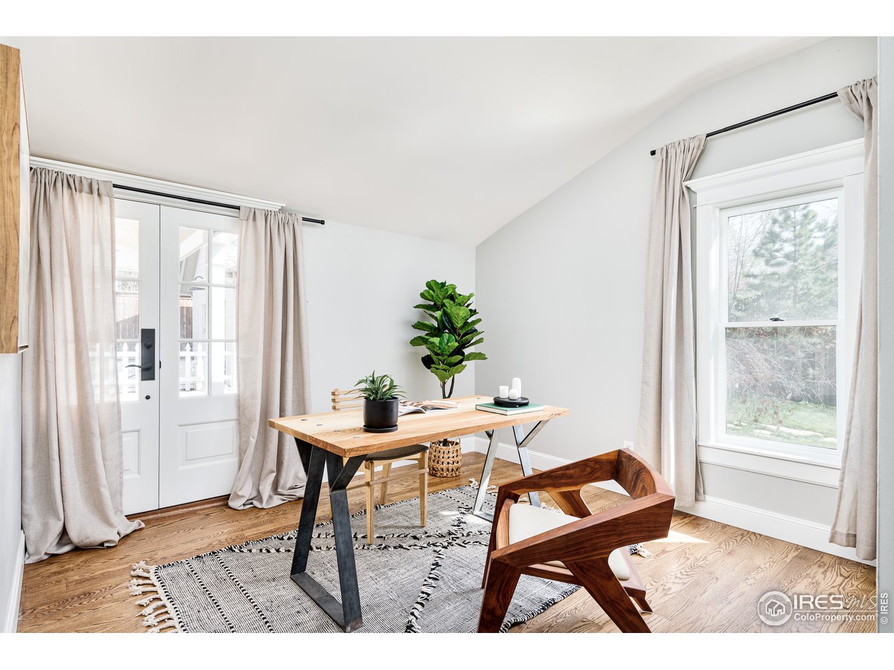 2303 Bluff Street Boulder, CO 80304 - Photo 8 of 40 a workspace with furniture and a window