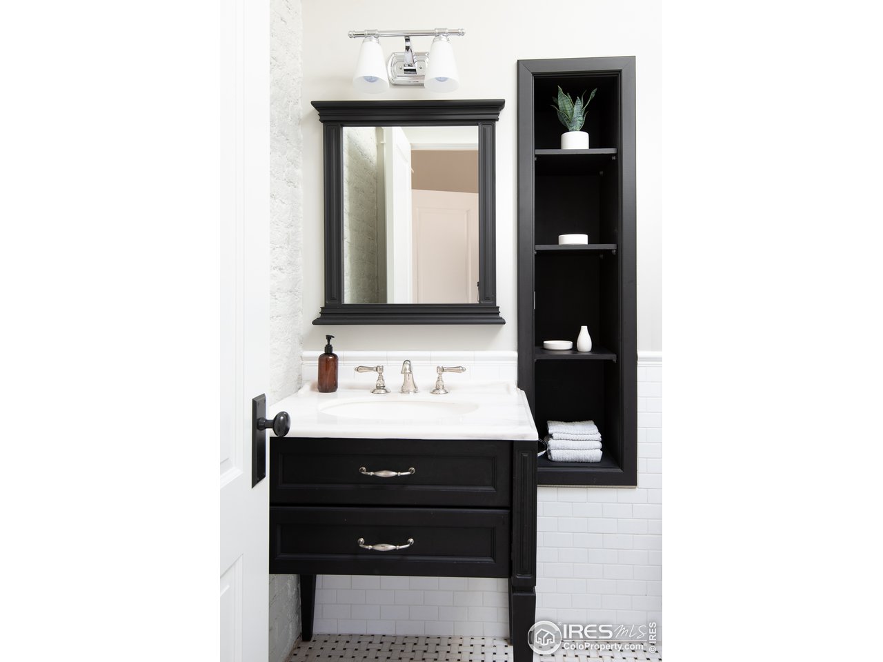 2303 Bluff Street Boulder, CO 80304 - Photo 9 of 40 a bathroom with a sink and a mirror