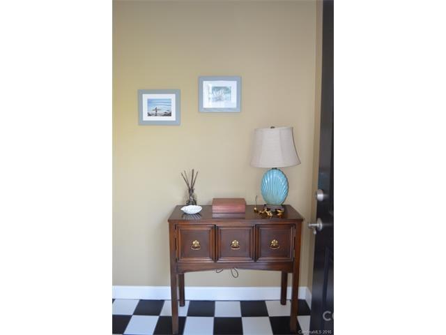 1313 Torrence Circle Davidson, NC 28036 - Photo 17 of 20 a bathroom with a granite countertop sink and a mirror