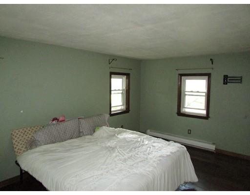 61 Searle Road Huntington, MA 01050 - Photo 14 of 16 a bedroom with a bed and a window