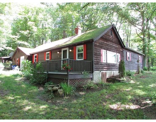 61 Searle Road Huntington, MA 01050 - Photo 2 of 16 a front view of a house with garden