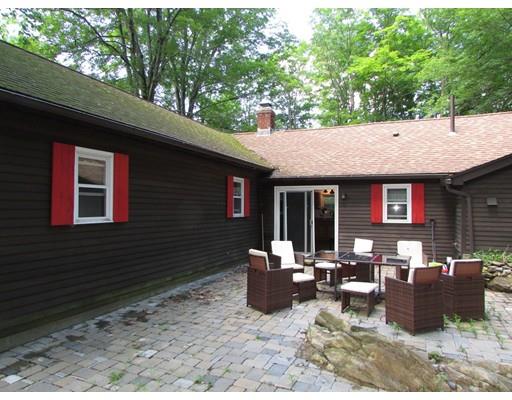 61 Searle Road Huntington, MA 01050 - Photo 5 of 16 a view of a house with a patio