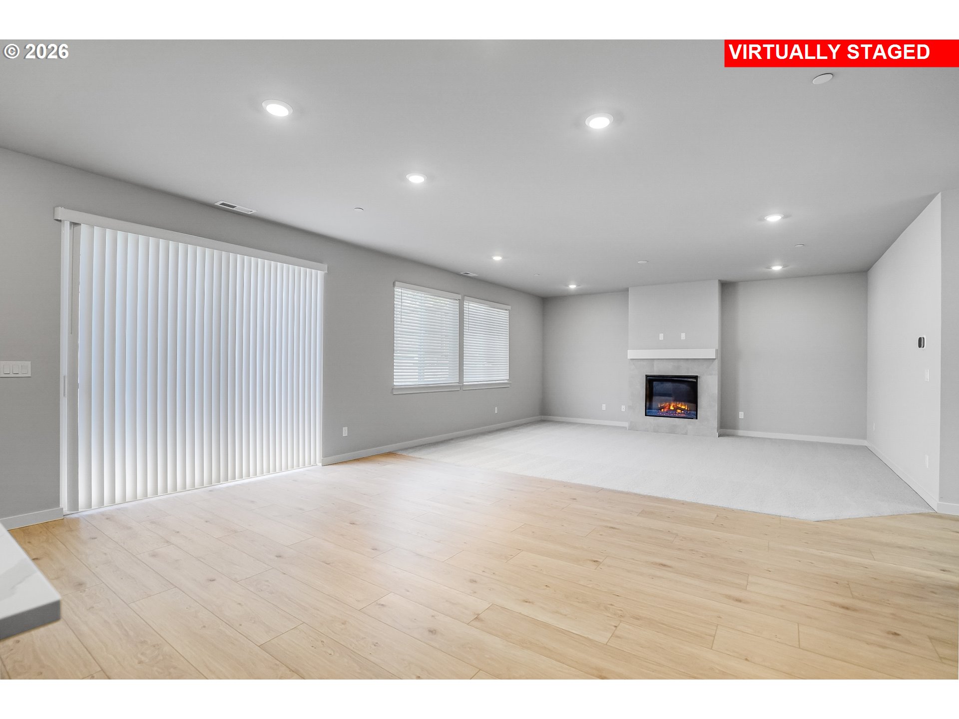 5297 North 87th Avenue Camas, WA 98607 - Photo 12 of 44 a view of an empty room with wooden floor