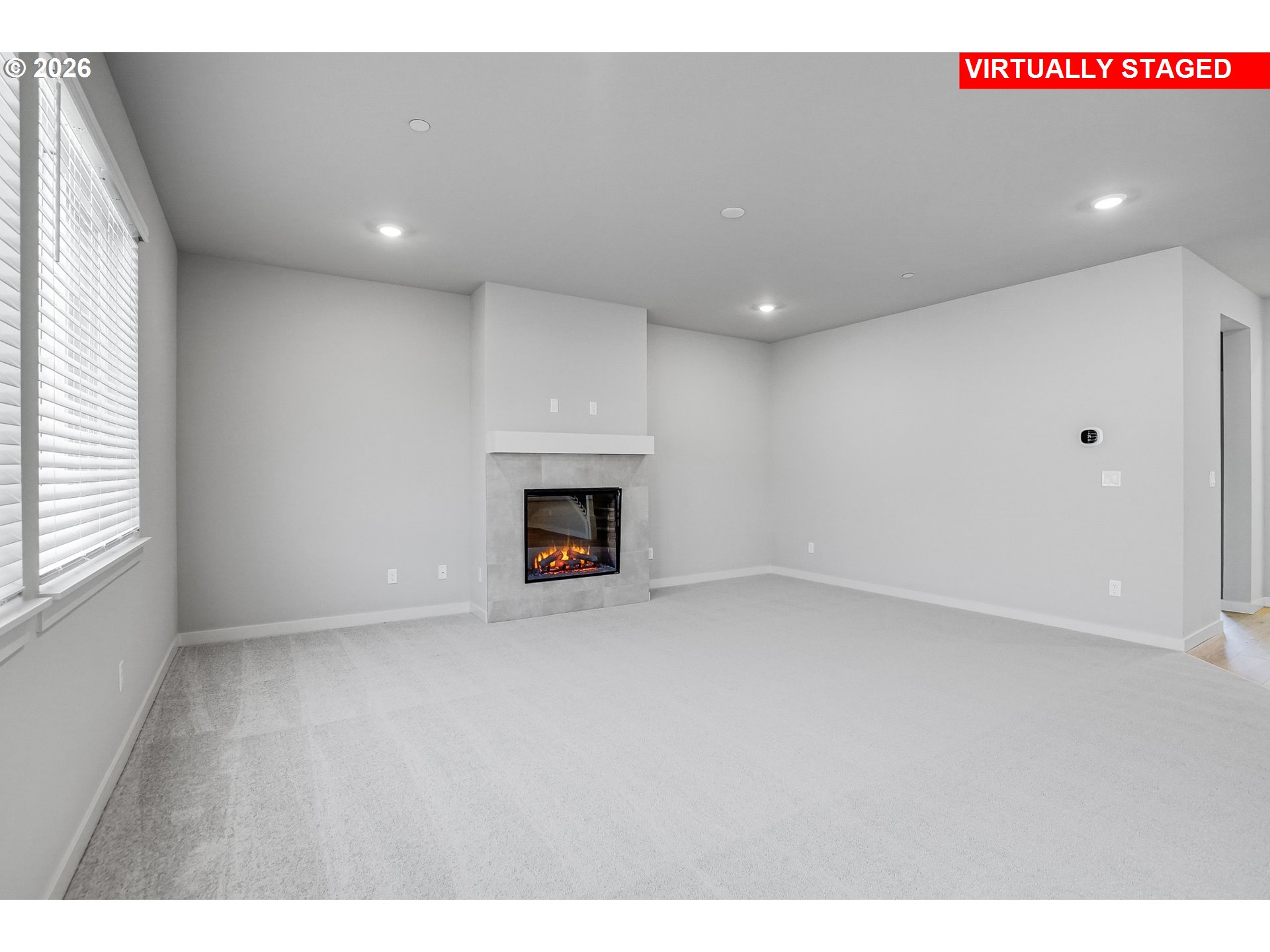 5297 North 87th Avenue Camas, WA 98607 - Photo 27 of 44 a view of an empty room with a fireplace