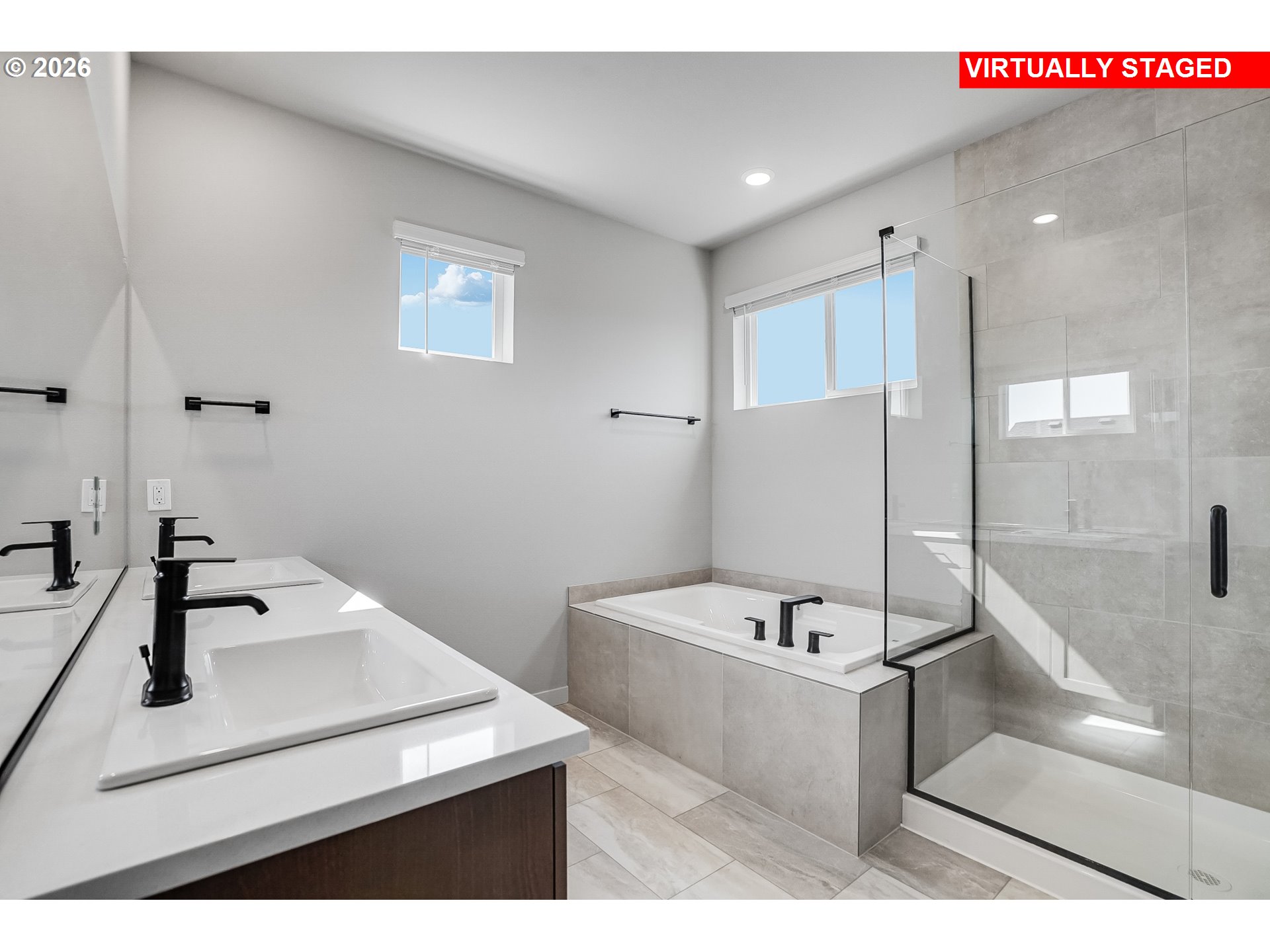 5297 North 87th Avenue Camas, WA 98607 - Photo 29 of 44 a bathroom with a sink tub and a mirror