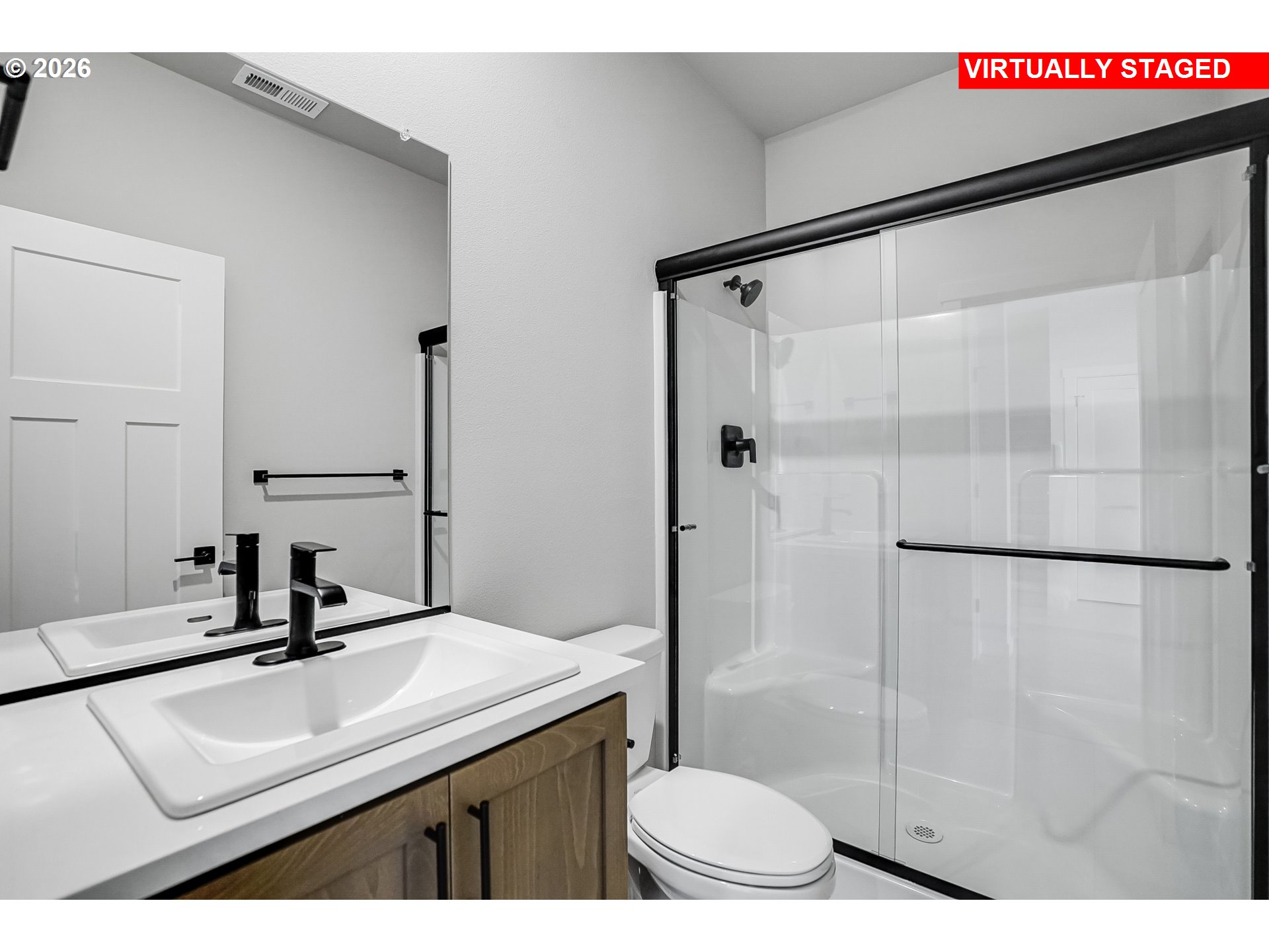 5297 North 87th Avenue Camas, WA 98607 - Photo 30 of 44 a bathroom with a sink and a mirror