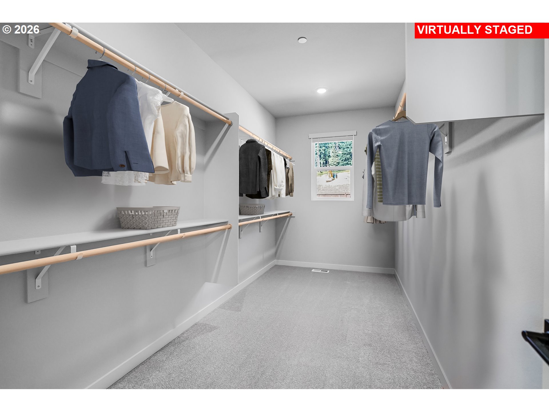 5297 North 87th Avenue Camas, WA 98607 - Photo 36 of 44 a view of walk in closet with clothes and shoes