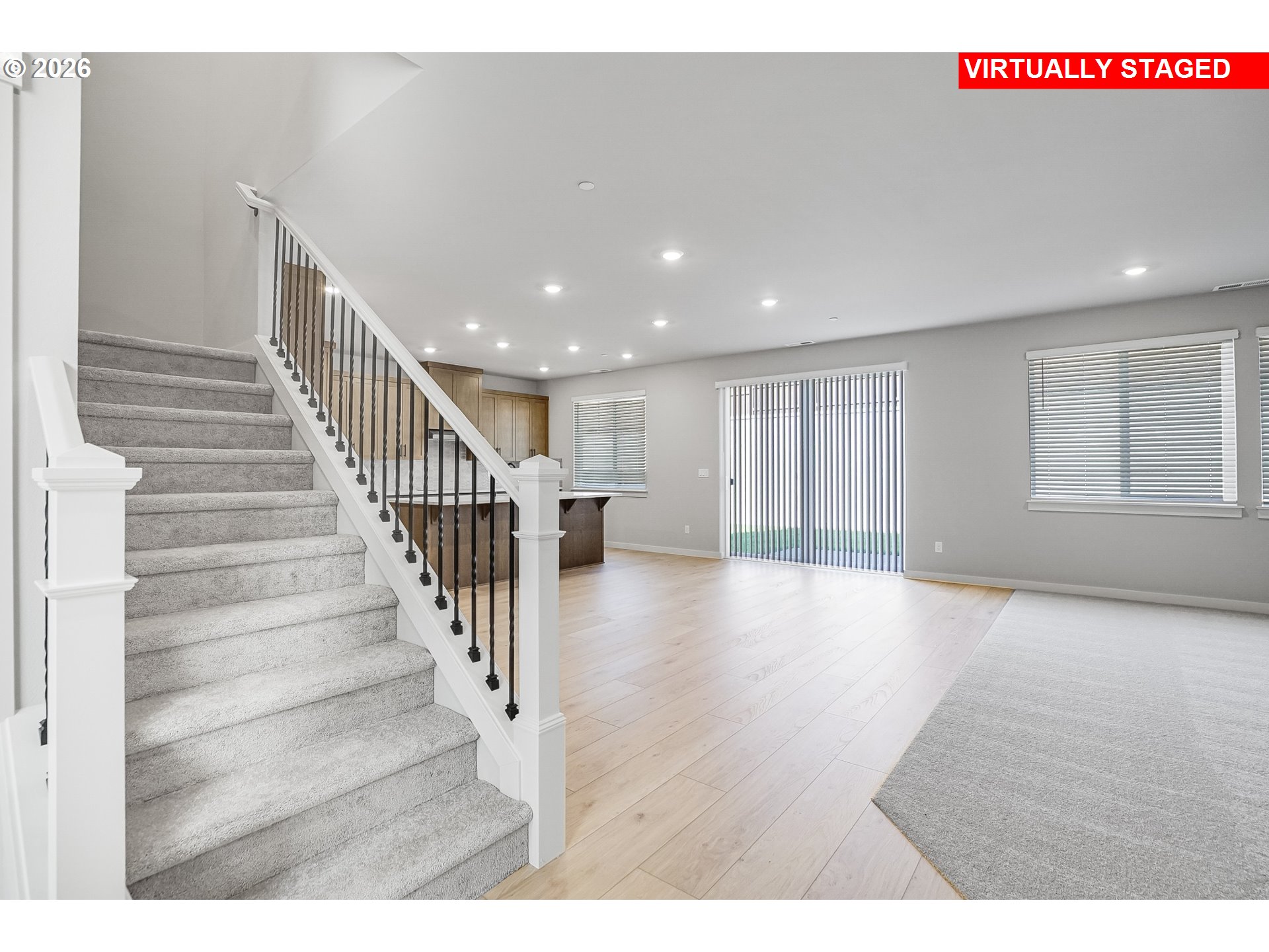 5297 North 87th Avenue Camas, WA 98607 - Photo 4 of 44 a view of a room with wooden floor and windows