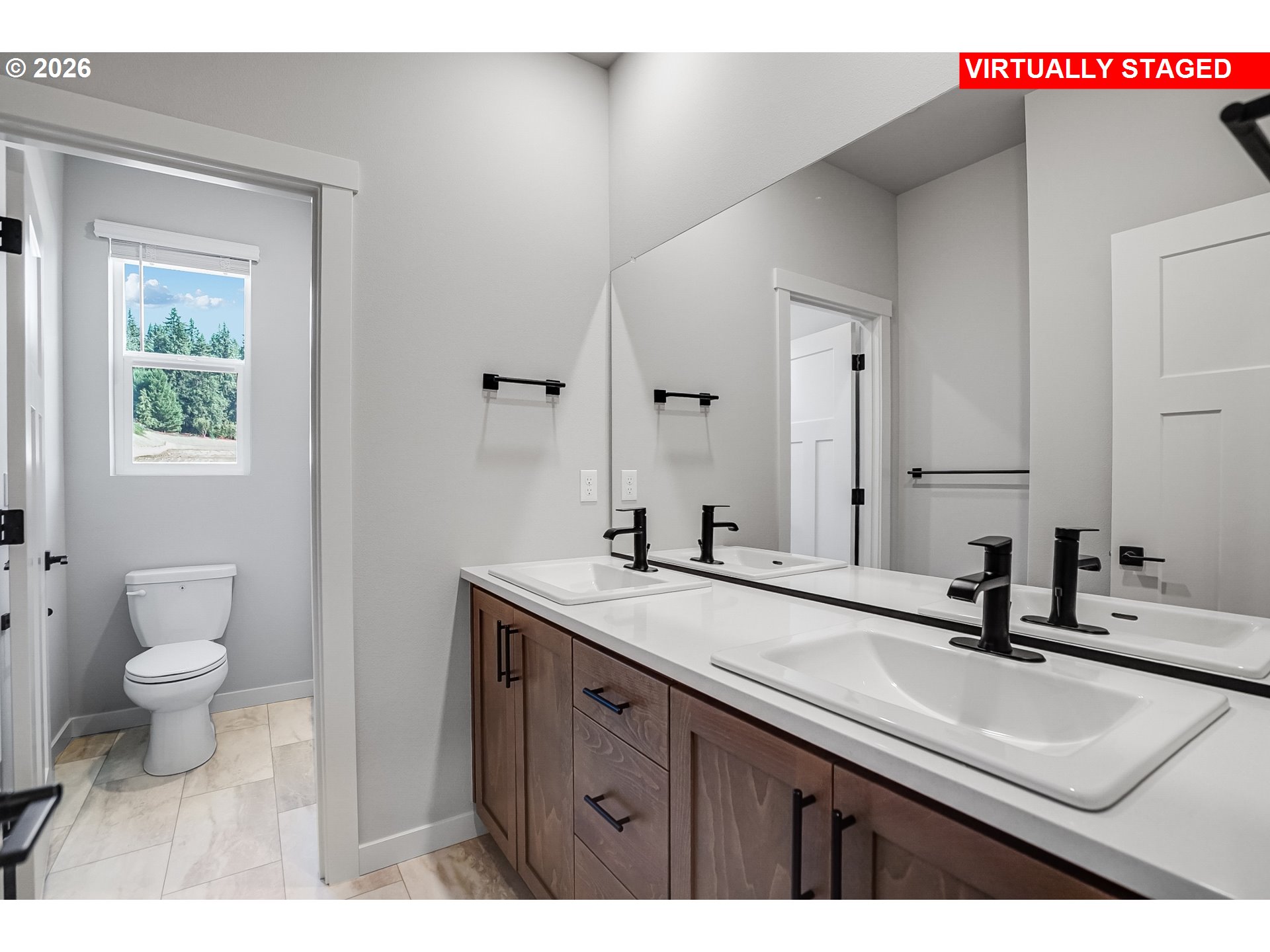 5297 North 87th Avenue Camas, WA 98607 - Photo 42 of 44 a bathroom with a sink and a mirror