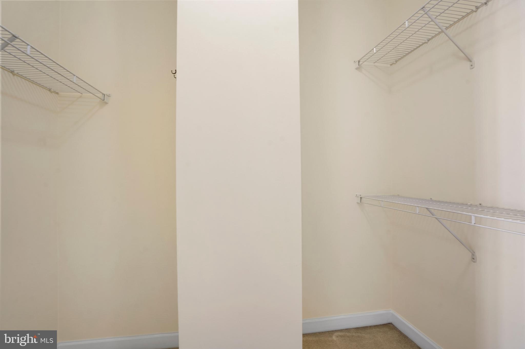 1111 25th Street Northwest, Unit 403 Washington, DC 20037 - Photo 14 of 24 a view of a room with racks on the wall