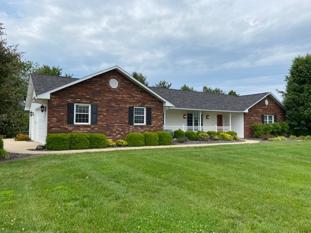 11426 East Radisson Road Mount Vernon, IL 62864 - Photo 42 of 56 a front view of a house with a yard