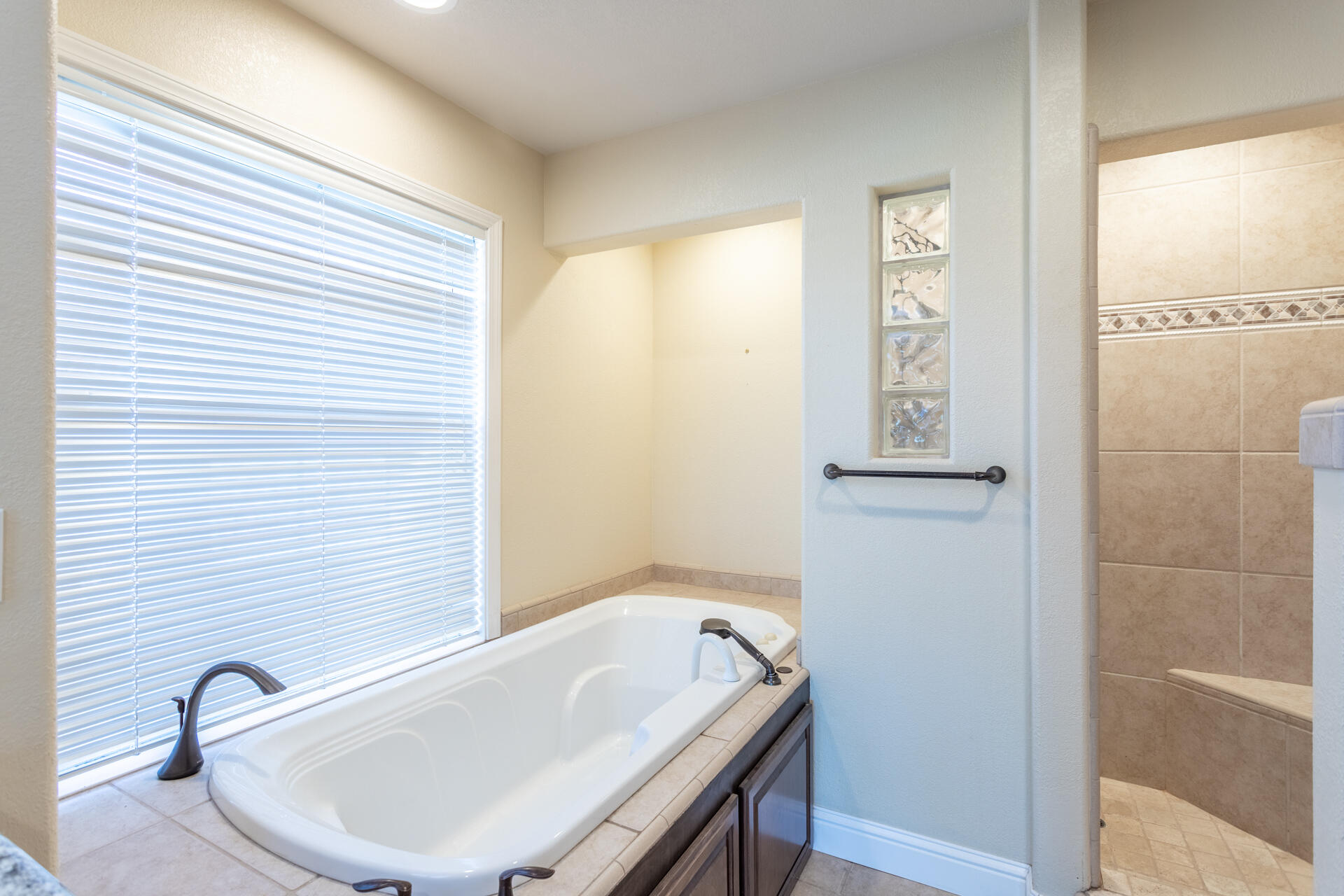 3126 Riesling Path Redding, CA 96001 - Photo 15 of 32 a bathroom with a sink and a bathtub