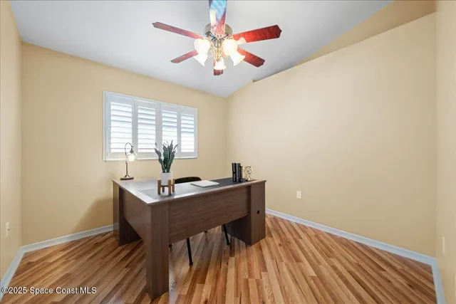 a workspace with furniture and window