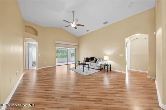 a view of dining room with furniture and wooden floor