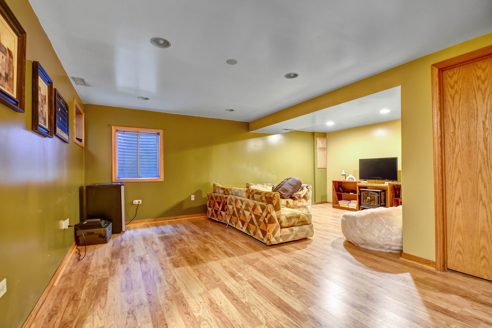 7420 Maple Drive Justice, IL 60458 - Photo 13 of 18 a bedroom with a bed and wooden floor