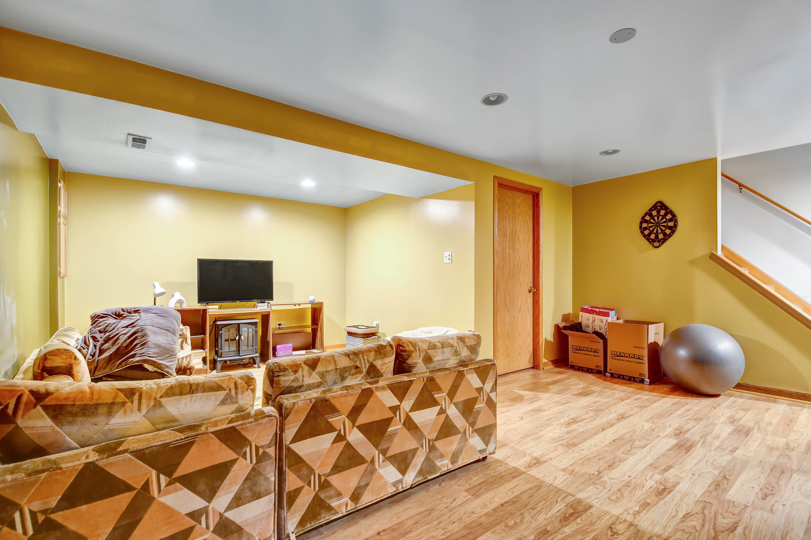 7420 Maple Drive Justice, IL 60458 - Photo 14 of 18 a bedroom with a bed and flat screen tv