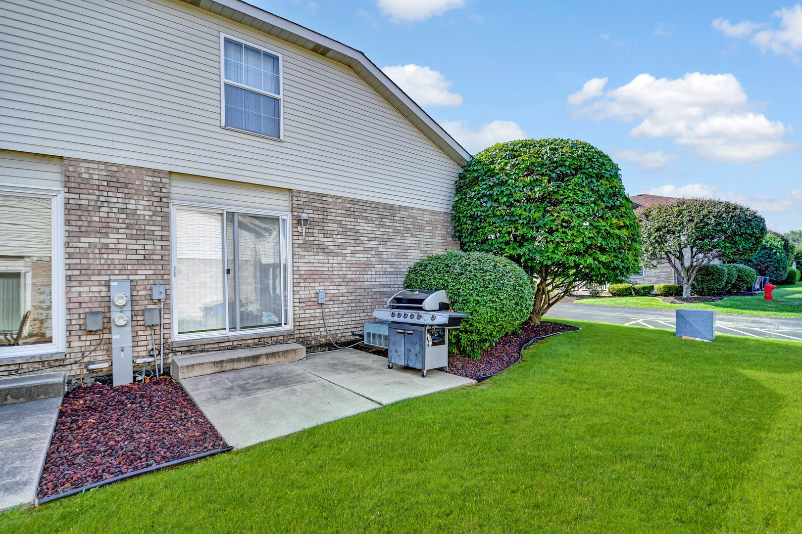 7420 Maple Drive Justice, IL 60458 - Photo 16 of 18 a front view of a house with garden