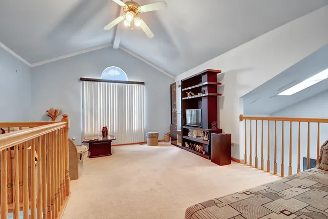 a bed room with a bed and a tv