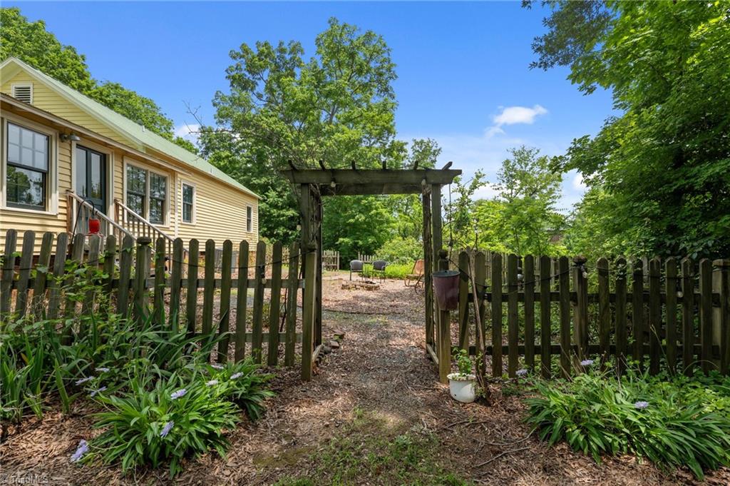 2409 Hodges Road Burlington, NC 27217 - Photo 34 of 45 Side Gardening Area