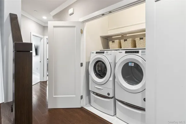 a utility room with dryer and washer