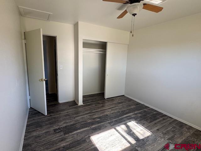 630 East Fourth Street, Unit A AND B Cortez, CO 81321 - Photo 11 of 28 a view of an empty room with wooden floor and a window