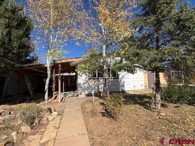 630 East Fourth Street, Unit A AND B Cortez, CO 81321 - Photo 18 of 28 a view of a pathway covered with snow on the road