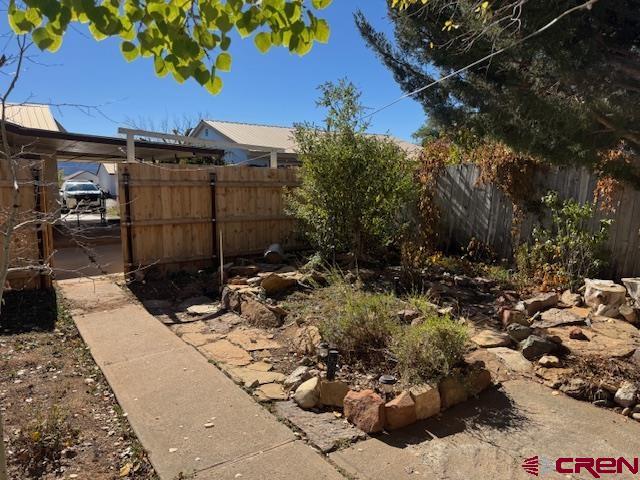 630 East Fourth Street, Unit A AND B Cortez, CO 81321 - Photo 19 of 28 a view of a backyard