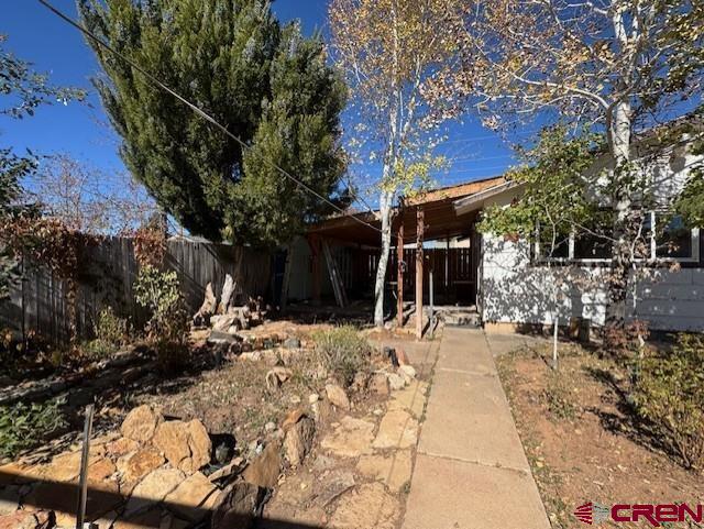 630 East Fourth Street, Unit A AND B Cortez, CO 81321 - Photo 27 of 28 a view of a house with a snow
