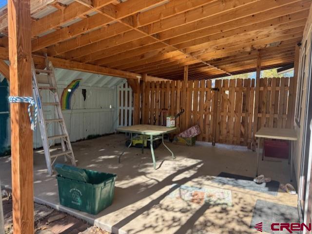 630 East Fourth Street, Unit A AND B Cortez, CO 81321 - Photo 28 of 28 a backyard with a table and chairs