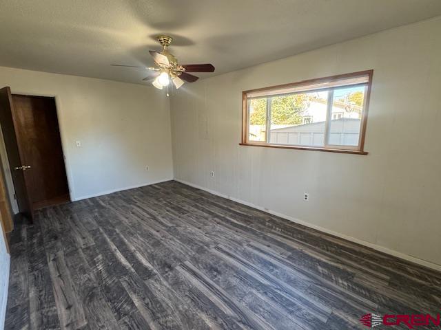 630 East Fourth Street, Unit A AND B Cortez, CO 81321 - Photo 5 of 28 a view of a livingroom with a ceiling fan and a window
