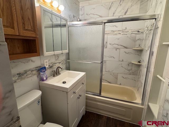 630 East Fourth Street, Unit A AND B Cortez, CO 81321 - Photo 6 of 28 a bathroom with a sink a toilet and shower