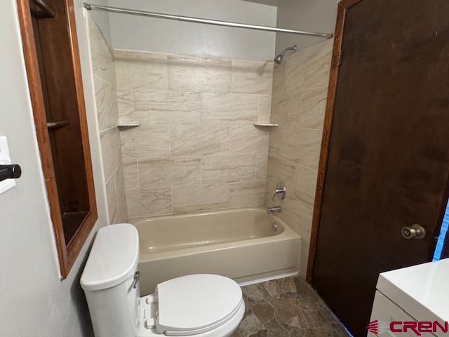 630 East Fourth Street, Unit A AND B Cortez, CO 81321 - Photo 9 of 28 a bathroom with a toilet and a shower