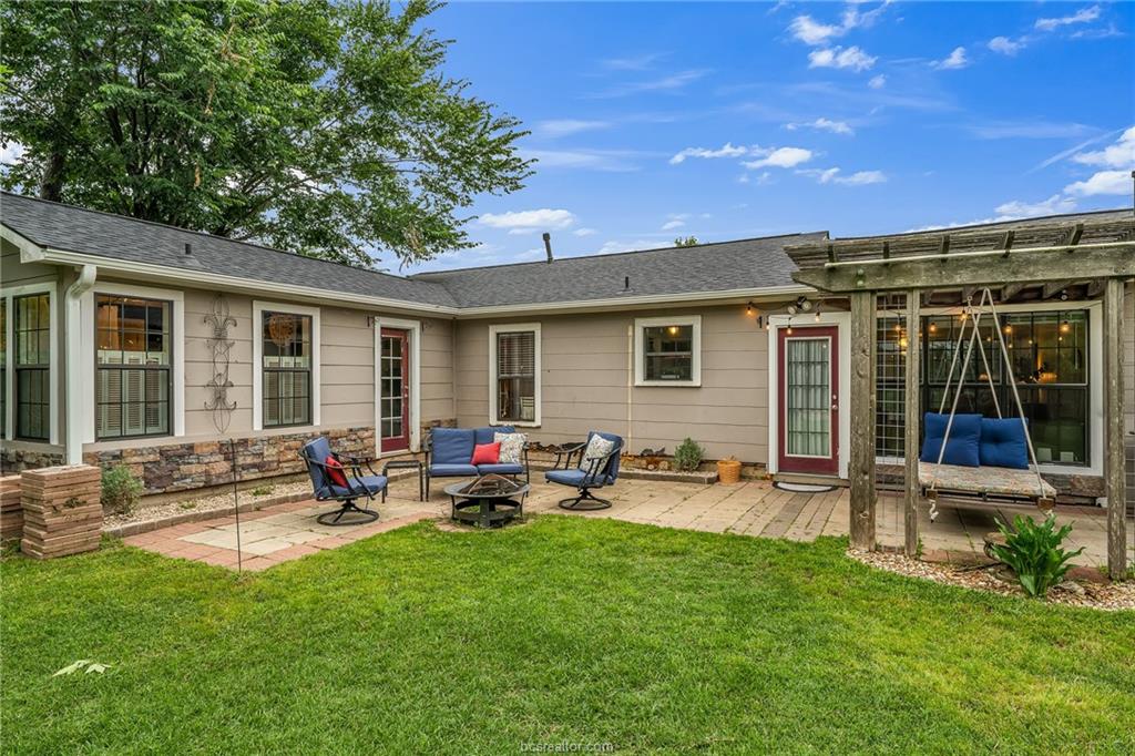 1414 East 29th Street Bryan, TX 77802 - Photo 19 of 21 a backyard of a house with outdoor seating